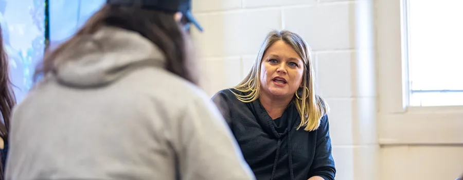 Professor speaking to student