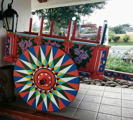 A Spanish cart sitting outside. 