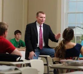 teacher speaking to students