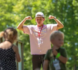 guy leading kids' recreation activities