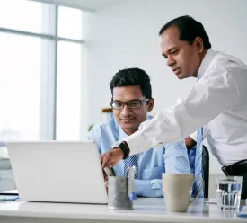 two businessmen working on a problem
