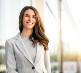 businesswoman standing outside company
