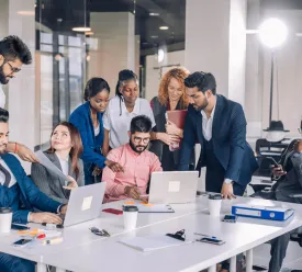 Business people working through a solution together