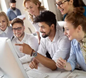 Businessman leading group through discussion