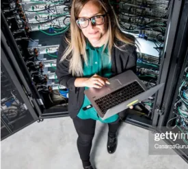 FPO graduate student with laptop