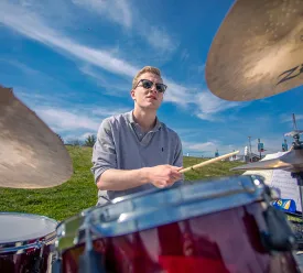 Jazz musician playing drum set