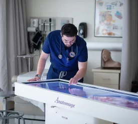 PA student using Anatomage table in PA lab