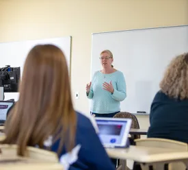 Female professor teaching a class