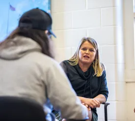 Professor speaking to student