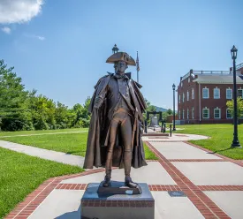 statue of George Washington on campus