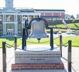 statue of the Liberty Bell on campus