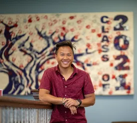 A Cumberlands senior poses in the student center