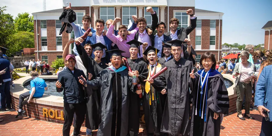 Group of graduates cheering