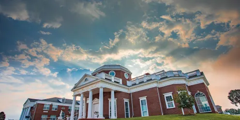 Sunrise with a campus building 