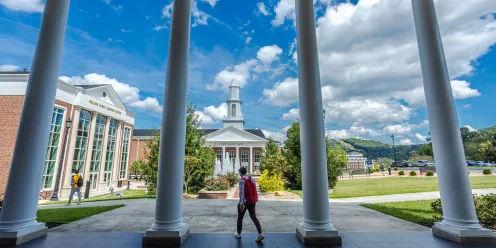 Students walk to class near the Grace Crum Rollins Center