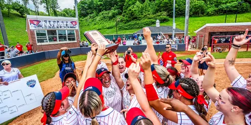 Cumberlands softball team celebrates after winning a tournament. 