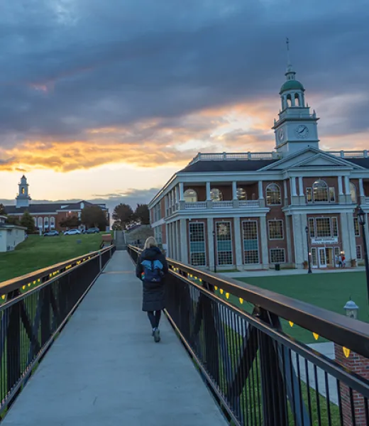 Test image of a student walking on a bridge. 