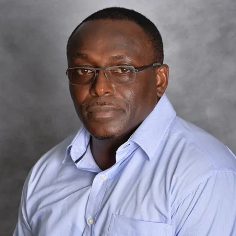 Dr. Charles Edeki