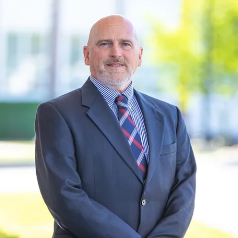 Dr. John Mark Toby