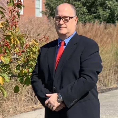 Dr. Aaron Isaacs