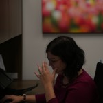 Overworked sitting at a desk