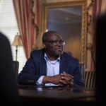 A businessman seated at a table