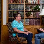 A counselor speaking with a student