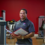 A personal trainer in a gym
