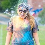 Students playing with super soakers
