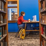 Student studying in a library