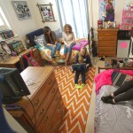 Students sitting in a dorm room