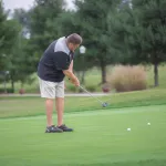 A golfer putting