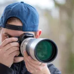 man holding camera