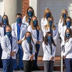 Students wearing physician coats