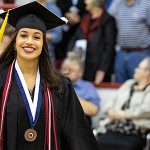 A student wearing a cap and gown