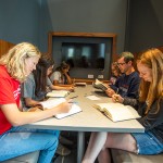 Students studying at a table
