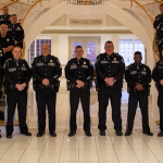 Police officers standing in line