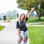 Student poses for a photo on campus