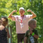 guy leading kids' recreation activities