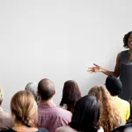 businesswoman gives presentation
