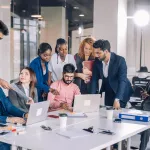 Business people working through a solution together