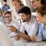 Businessman leading group through discussion
