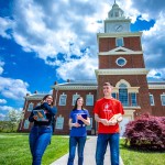 Students walk outside Hutton School of Business