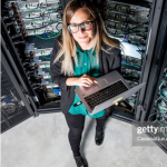 FPO graduate student with laptop