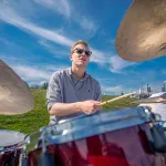 Jazz musician playing drum set