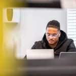 A student using a laptop