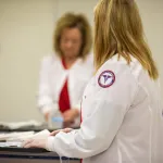 Nurses standing in the backround