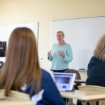 A counselor speaking to a class