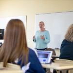 Female professor teaching a class