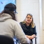 Professor speaking to student